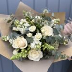 White flower bouquet in gift wrap called Ivory Florals