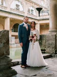 Bride and groom at Roman Baths having just tied the knot