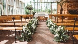 Wedding aisle florals at Syrencot
