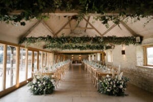 Old Gore Barn dressed with ivory, lilac and purple florals