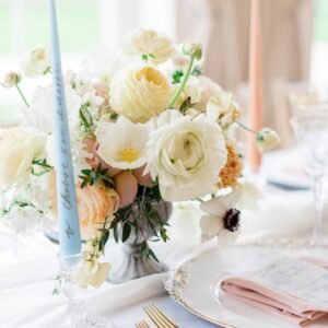 Grey metal vessel filled with flowers