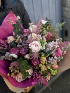 A mixed pink toned bouquet of flowers
