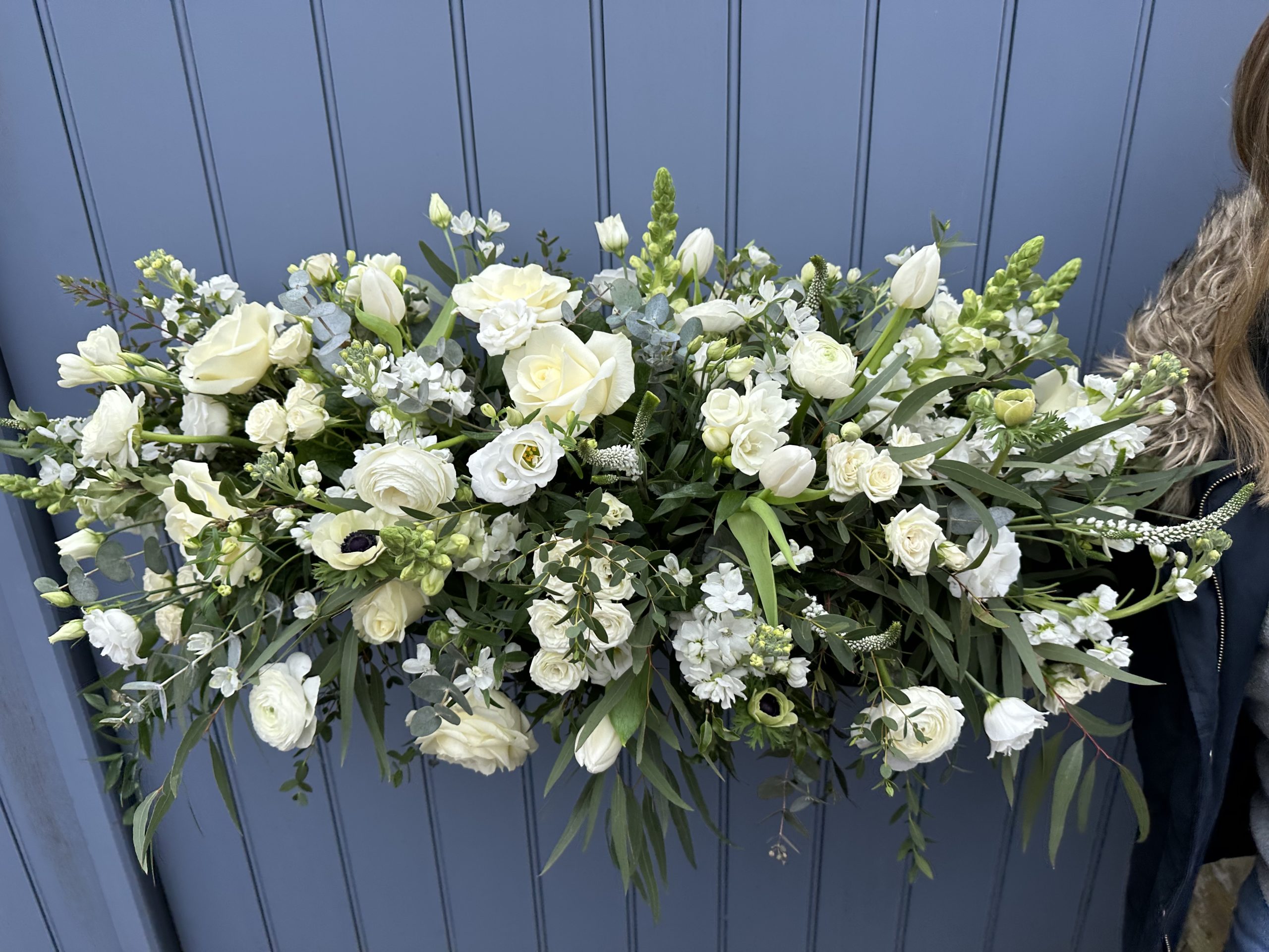 White, ivory and green double ended coffin arrangement