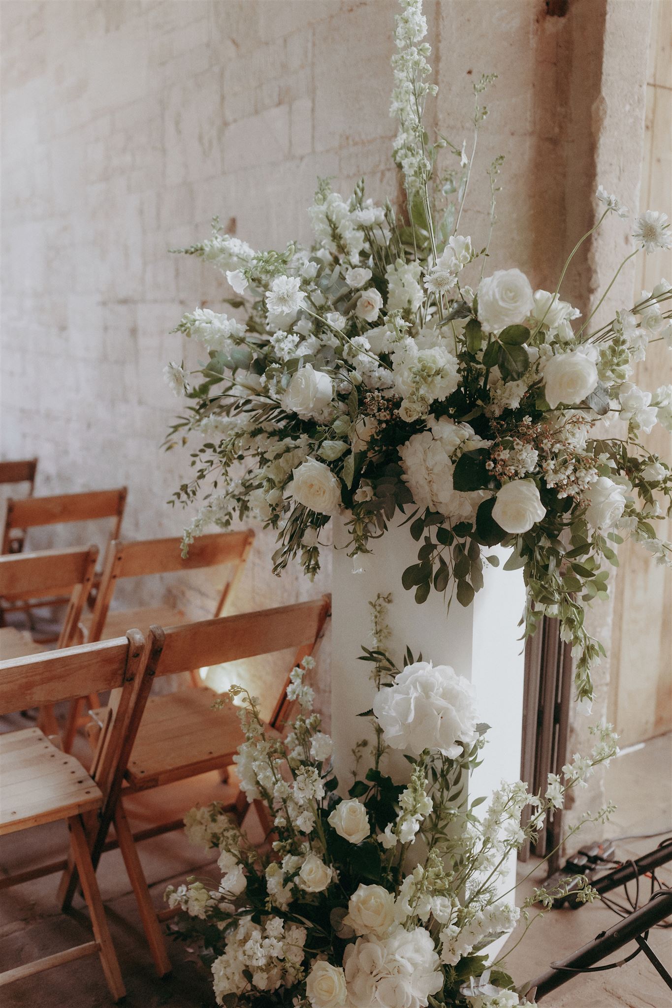 White and green wedding plinth flowers