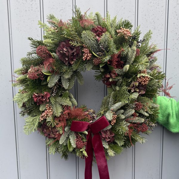 Beautifully textured and natural ruby wreath with velvet bow